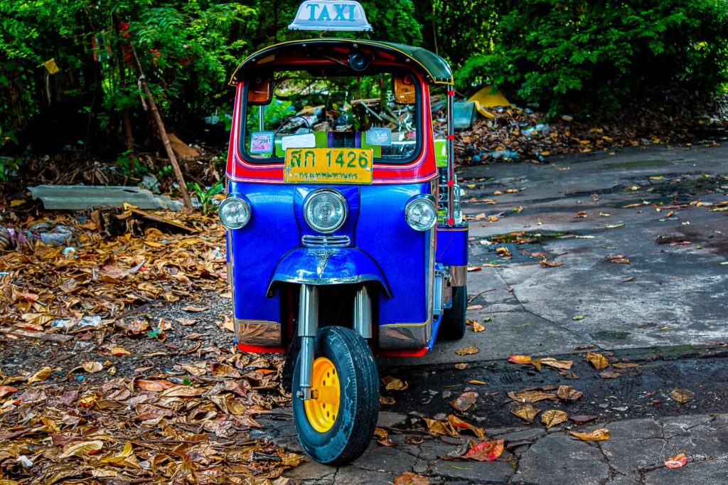 Bangkok’s iconic Tuk-Tuk Taxi. Roar! Whir! Vroom! Flying hair, jumps and bumps. Bangkok’s famous; Tourist’s favourite open-air fun ride!